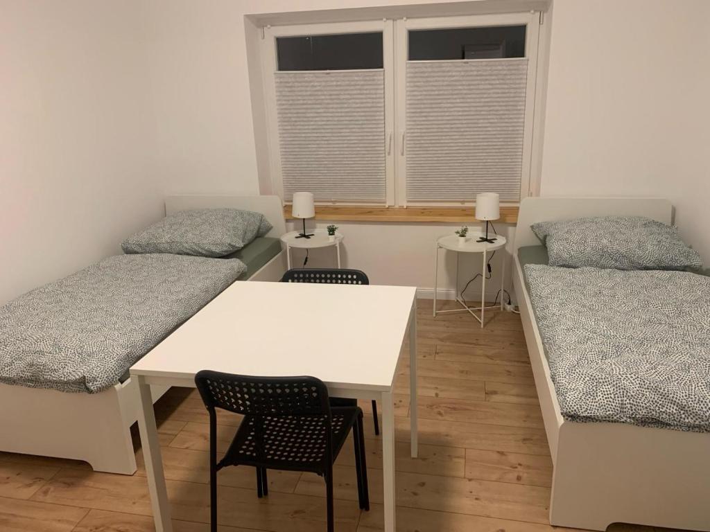 Postel nebo postele na pokoji v ubytování Rosengarten