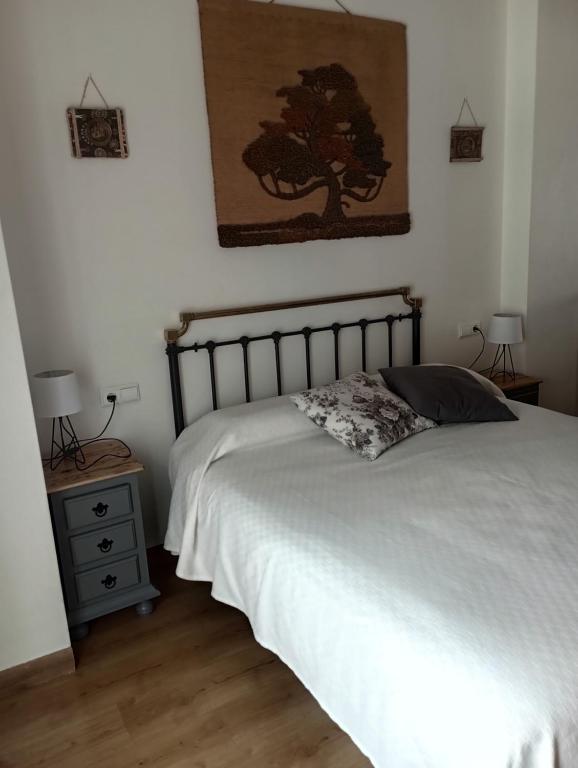 Łóżko lub łóżka w pokoju w obiekcie CASA TEO