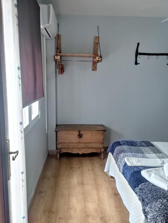 Łóżko lub łóżka w pokoju w obiekcie CASA TEO