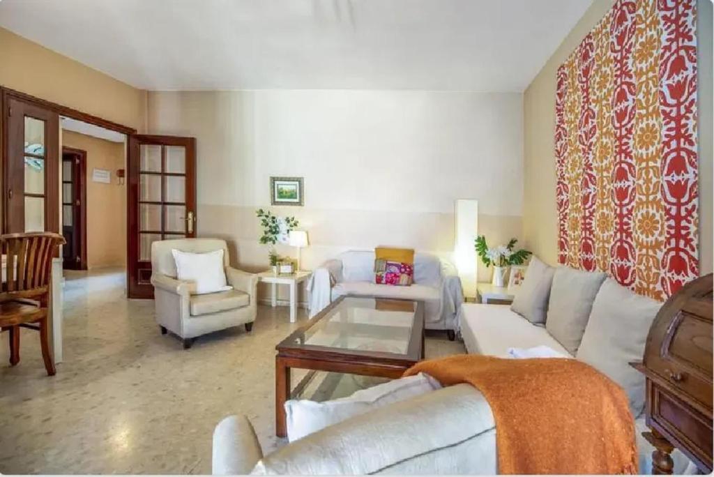 A seating area at Charming apartment in El Puerto de Santa María with terrace
