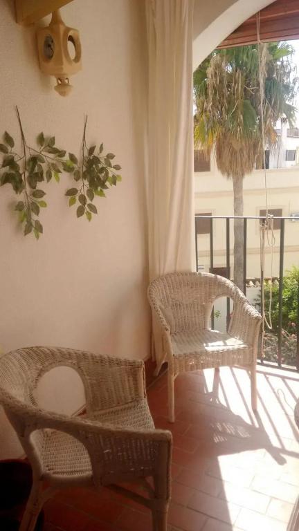 A seating area at Charming apartment in El Puerto de Santa María with terrace