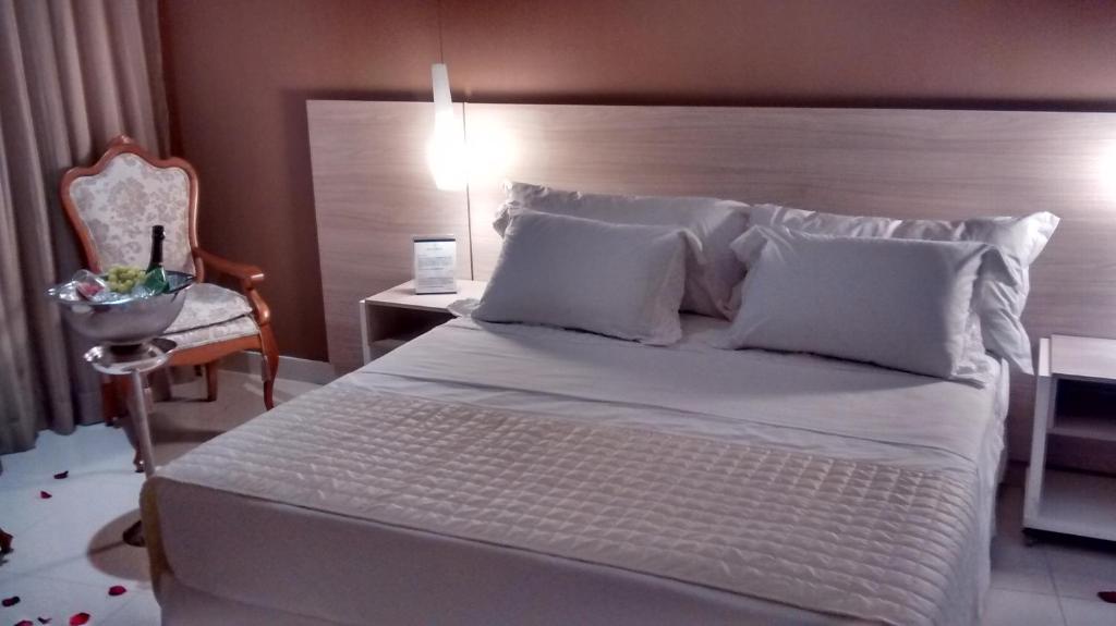 Postel nebo postele na pokoji v ubytování Granterrara Hotel