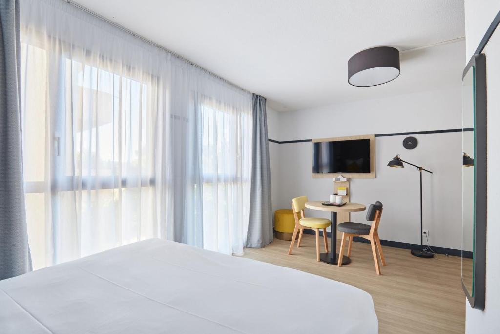 Appart Hotel Odalys City Aix en Provence Les Floridianes - Resim 3