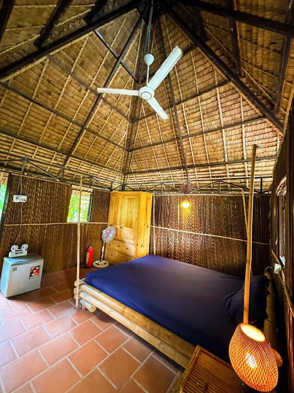 Postel nebo postele na pokoji v ubytování Homestay Mekong Can Tho