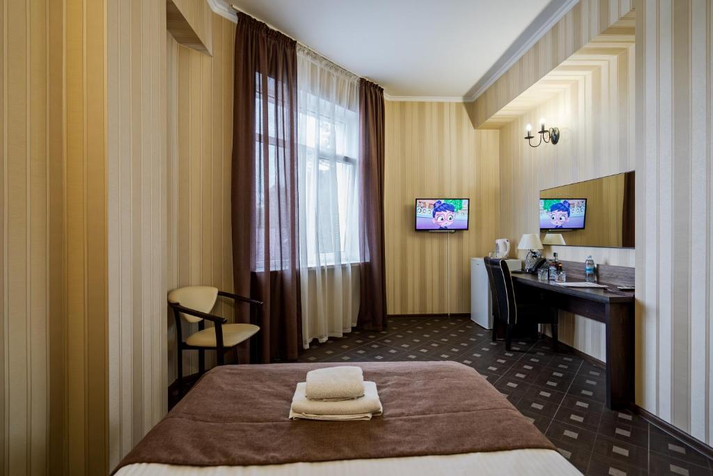 TV a/nebo společenská místnost v ubytování Hotel Verhovina