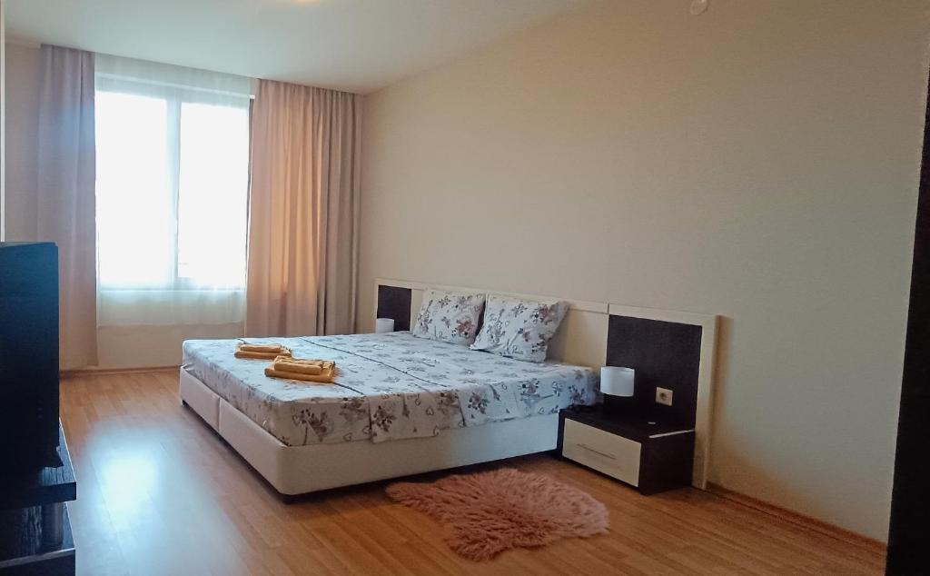 Postel nebo postele na pokoji v ubytování Europroperties Iglika Apartments