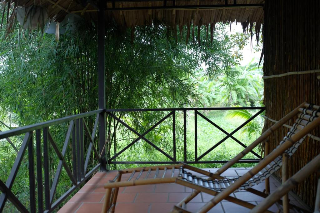 Balkón nebo terasa v ubytování Hometravel Mekong Can Tho