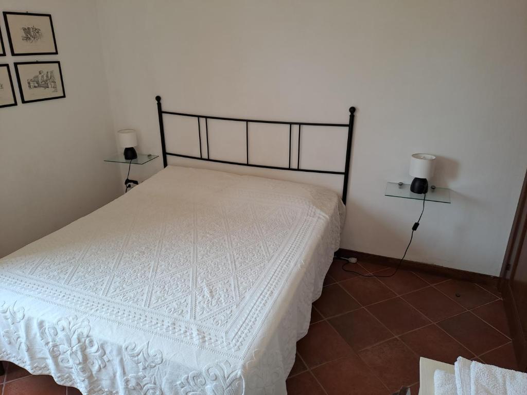 Postel nebo postele na pokoji v ubytování B&B Castiglias