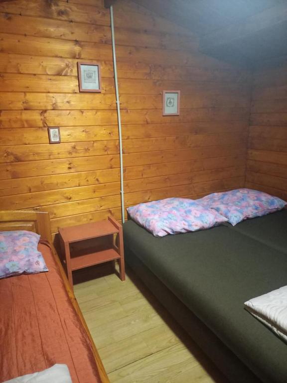 Postel nebo postele na pokoji v ubytování Napfény Camping