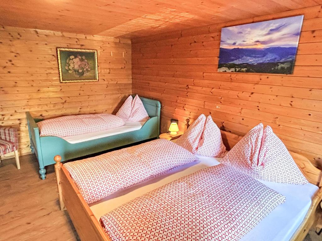 Posteľ alebo postele v izbe v ubytovaní Holiday Home Hochzillertalblick by Interhome