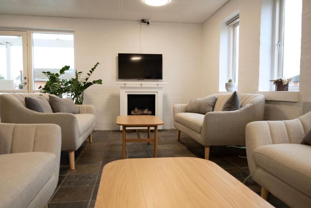 TV a/nebo společenská místnost v ubytování Hotel Korning