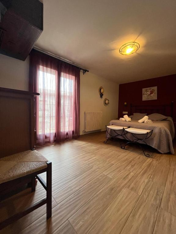 Postel nebo postele na pokoji v ubytování Fonda Carrera