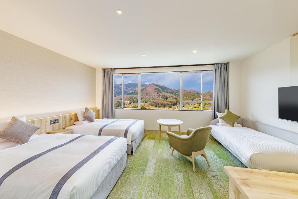 Postel nebo postele na pokoji v ubytování KAMENOI HOTEL Nagatoro Yorii