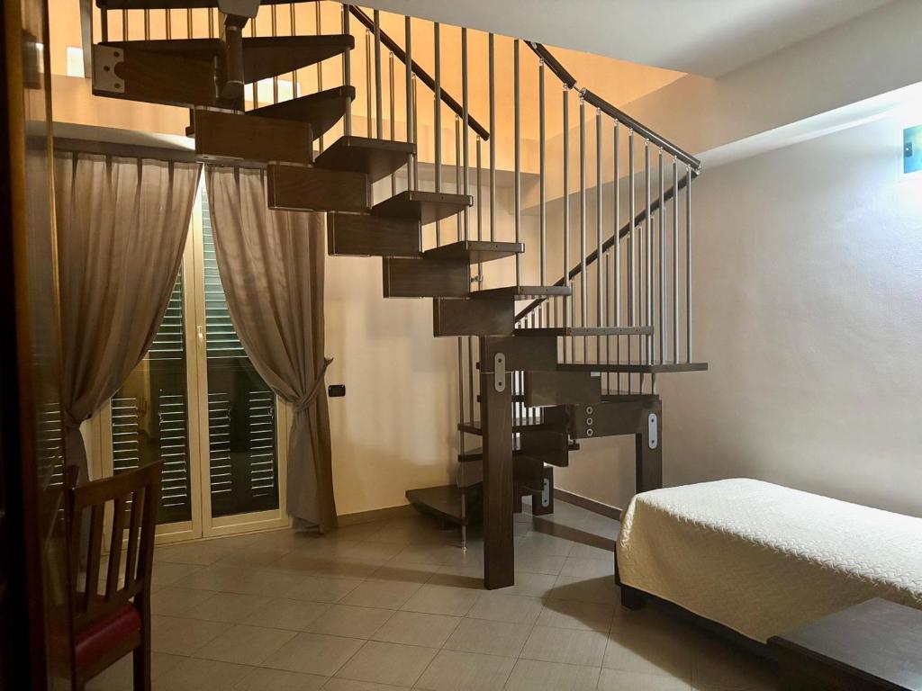 Postel nebo postele na pokoji v ubytování Albanuova Hotel
