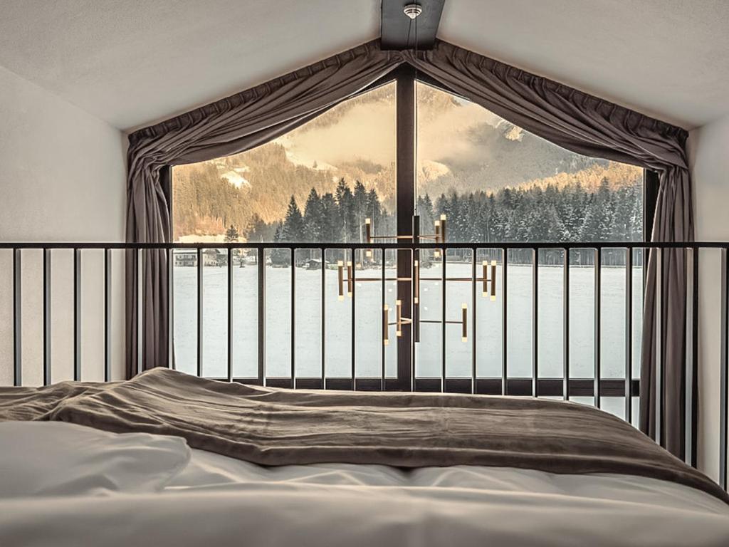 Postel nebo postele na pokoji v ubytování Såndgøld Alpine Glamping