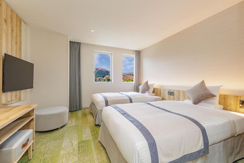 Postel nebo postele na pokoji v ubytování KAMENOI HOTEL Nagatoro Yorii