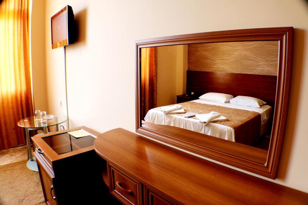 Postel nebo postele na pokoji v ubytování Hotel Condori