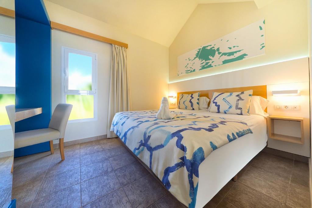 Postel nebo postele na pokoji v ubytování Salt Apartments Vistalmar