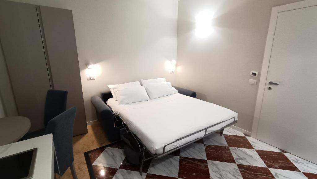 Postel nebo postele na pokoji v ubytování Andreola Central Hotel