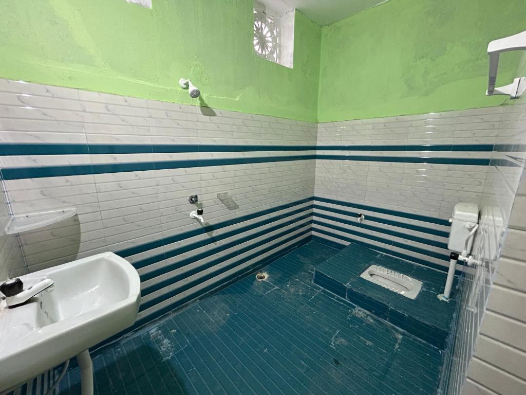 Koupelna v ubytování Manoranjan villa