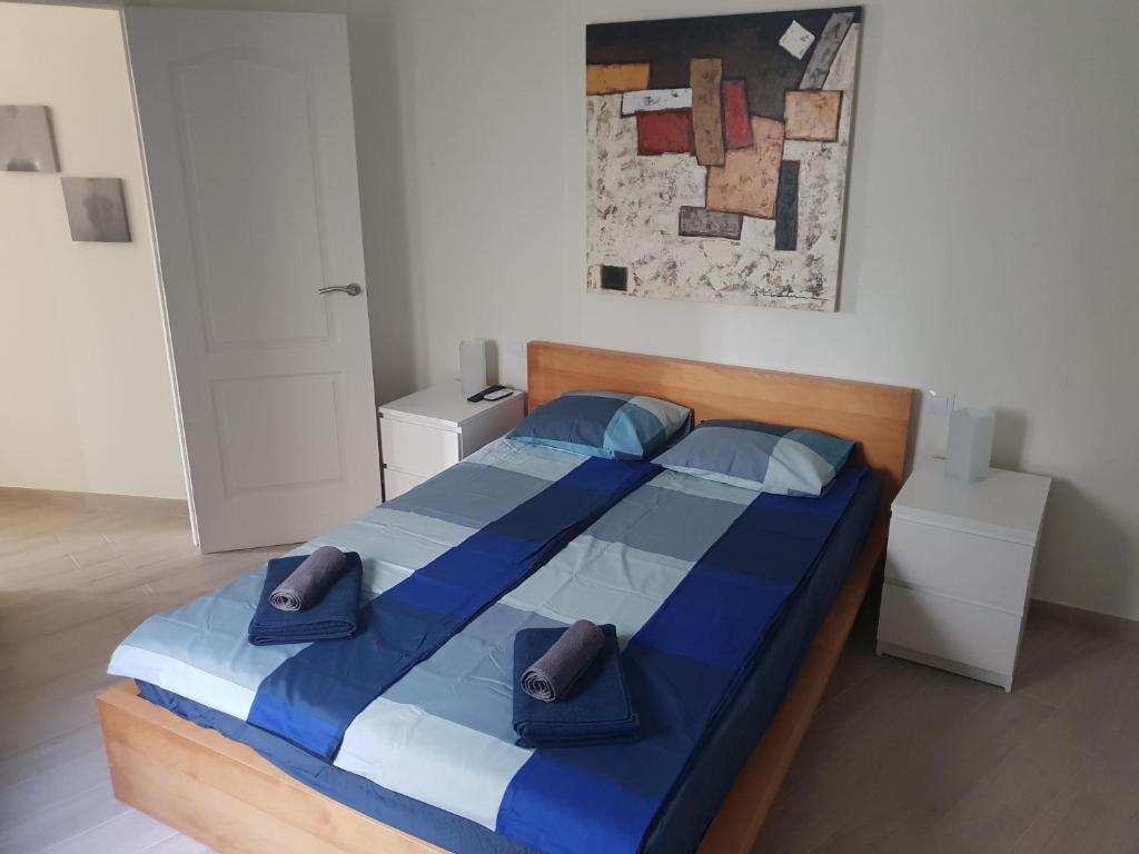 Łóżko lub łóżka w pokoju w obiekcie Ruhige Ferienwohnung Für 4 Personen