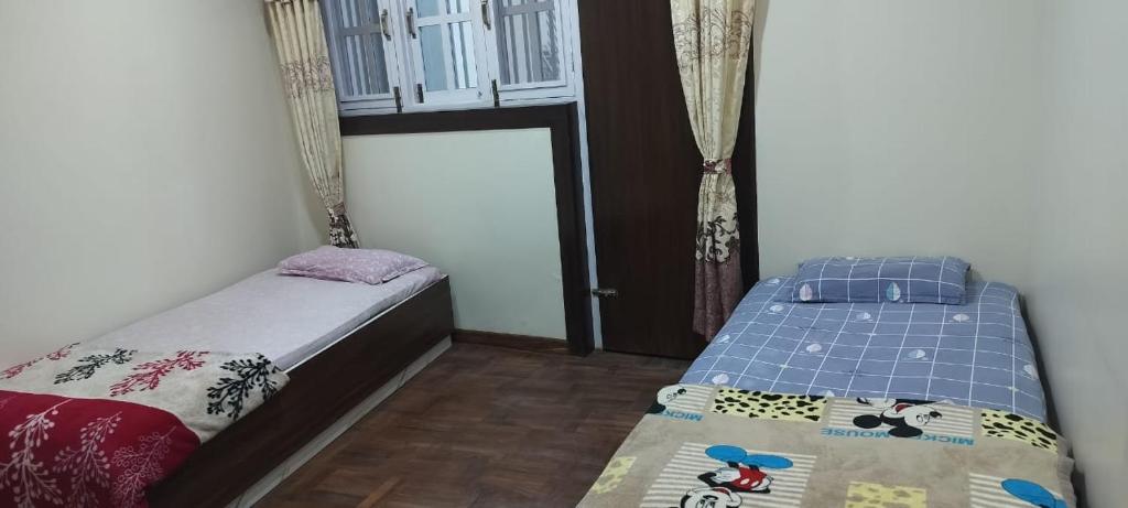 Postel nebo postele na pokoji v ubytování Diyalo Home