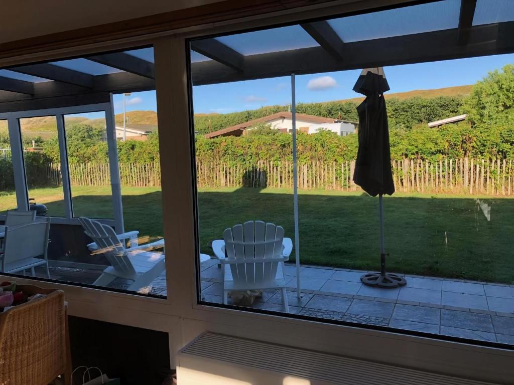 Fotografie z fotogalerie ubytování Schönes Ferienhaus Strandopgang In Julianadorp v destinaci De Zandloper