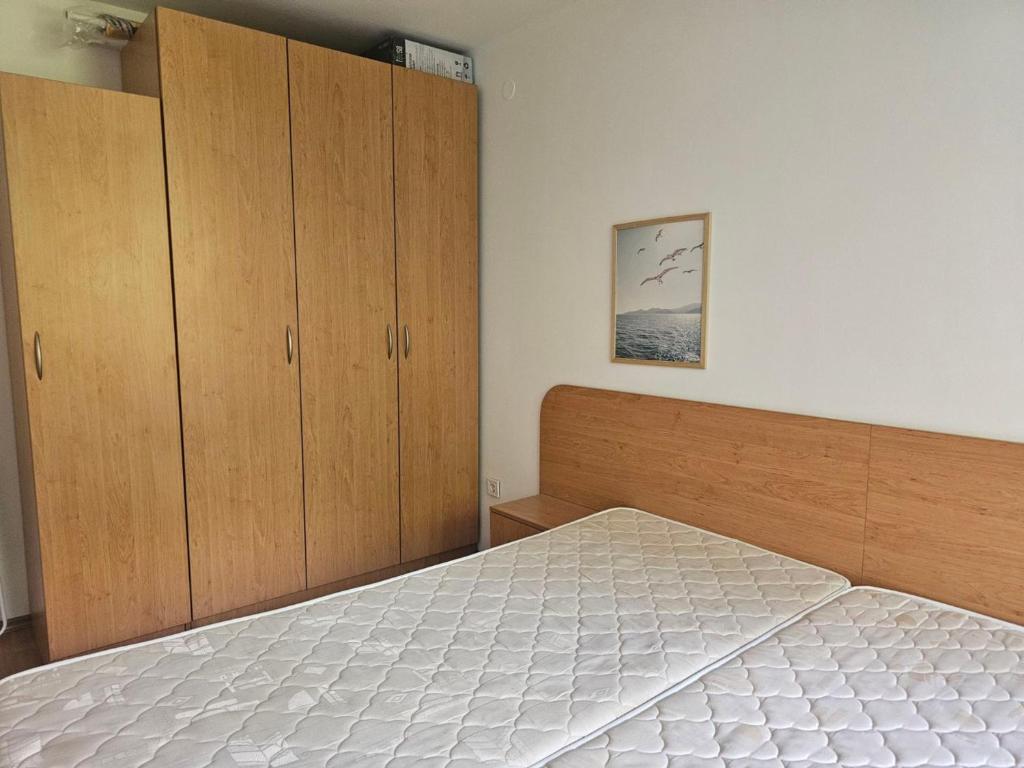 Postel nebo postele na pokoji v ubytování Europroperties Iglika Apartments