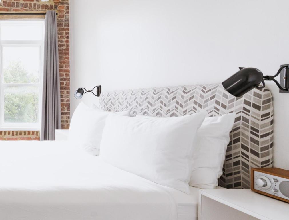 Postel nebo postele na pokoji v ubytování Hotel Hive