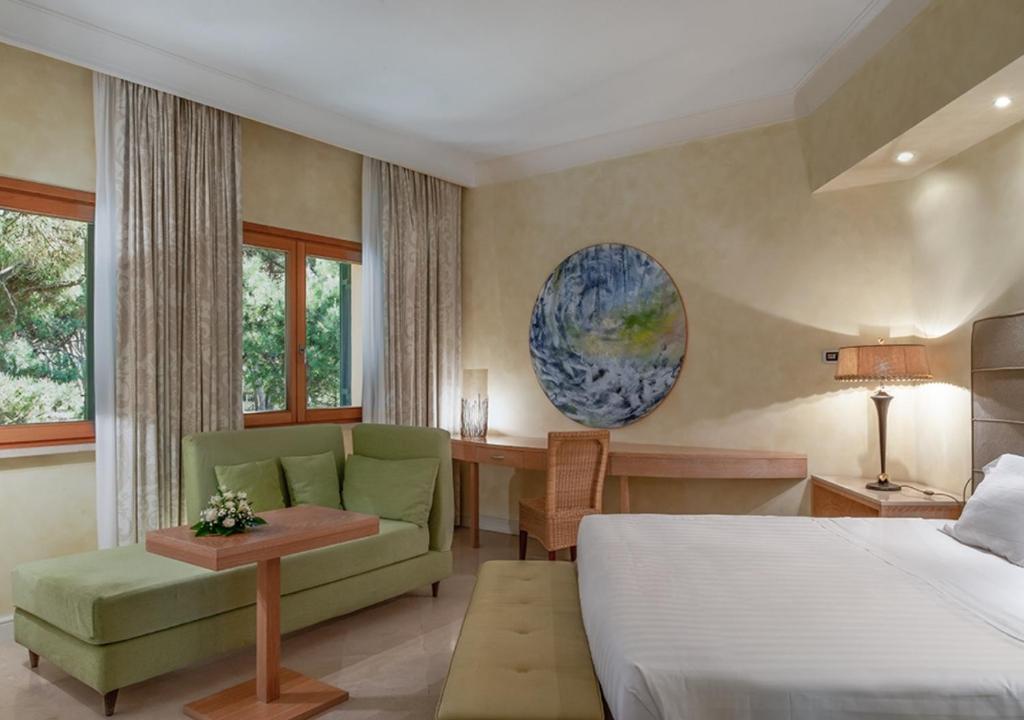 Tombolo Talasso Resort - Superior Driepersoonskamer Met Uitzicht Op De Tuin
