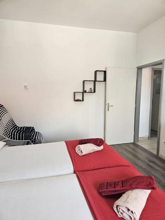 Postel nebo postele na pokoji v ubytování Rooms kman