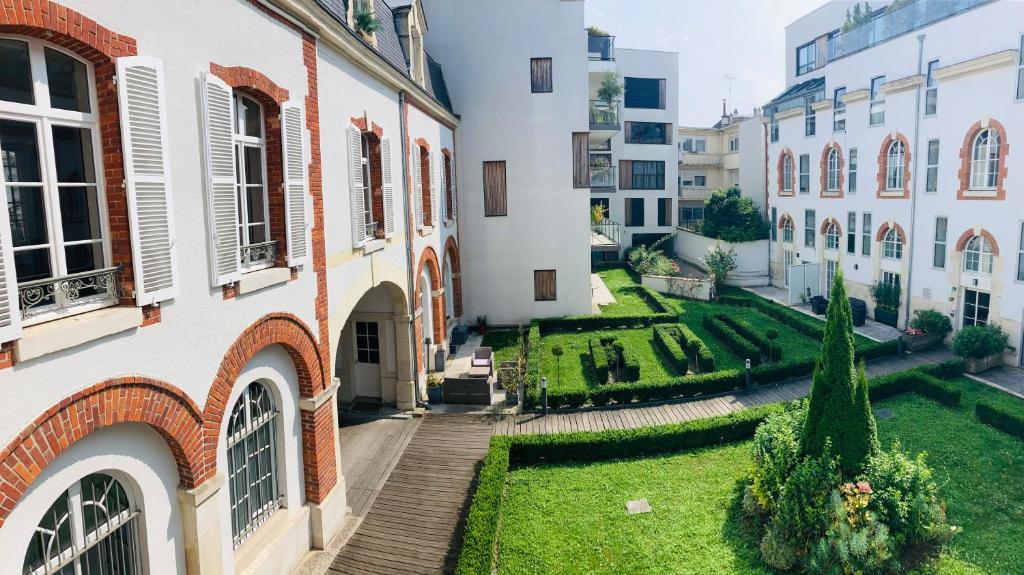 Κήπος έξω από το So Guest- Pépite de charme proche cathédrale, climatisation Parking