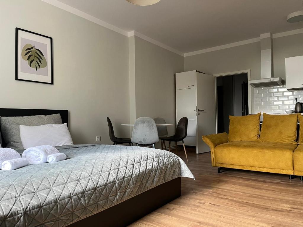 Postel nebo postele na pokoji v ubytování DORMIDARE Apartments Mladá Boleslav