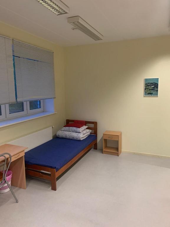 Postel nebo postele na pokoji v ubytování Ikla Grill & Hostel