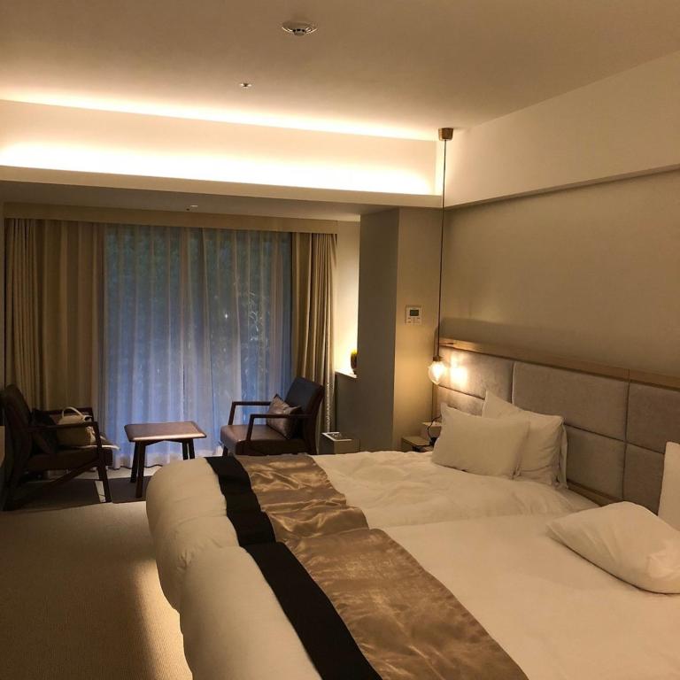 Postel nebo postele na pokoji v ubytování Hotel Atlantiis Suites Near IGI Airport