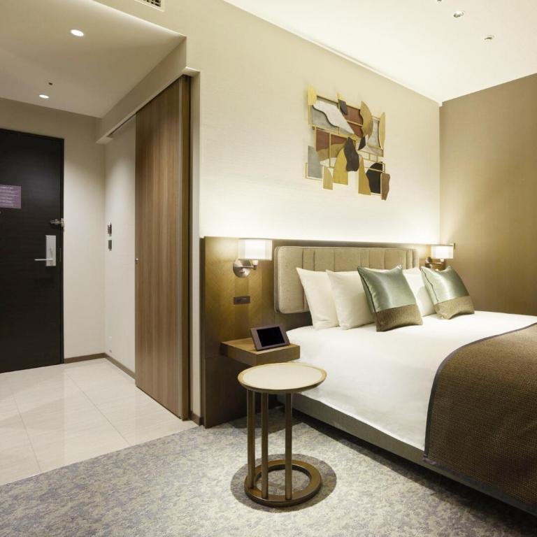 Postel nebo postele na pokoji v ubytování Hotel Atlantiis Suites Near IGI Airport