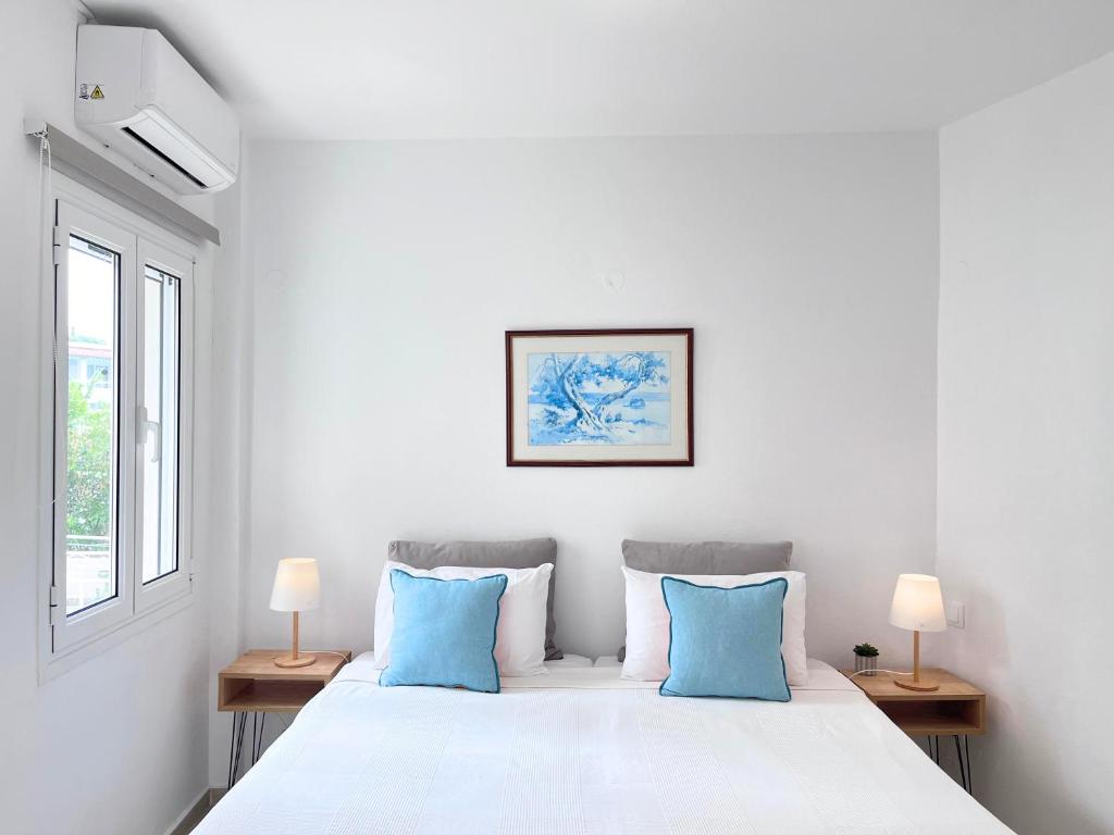 Postel nebo postele na pokoji v ubytování NiSea Apartments