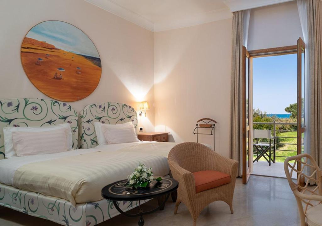 Tombolo Talasso Resort - Camera Tripla Superior Con Vista Mare Parziale