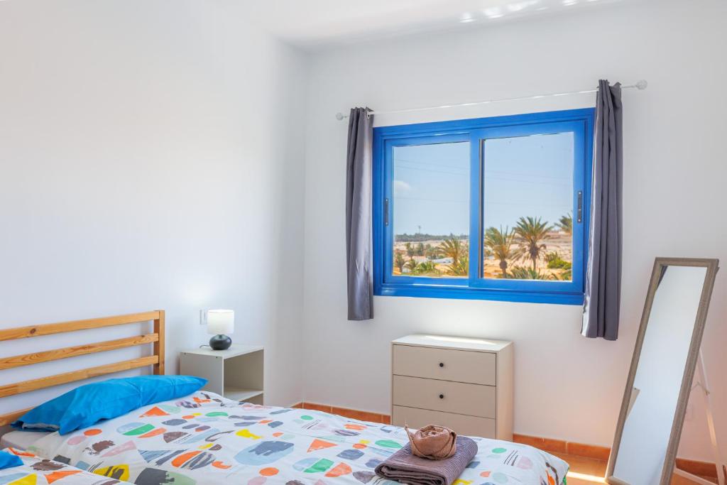 Ένα ή περισσότερα κρεβάτια σε δωμάτιο στο Casa Marco