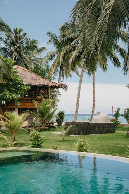 Bazén v ubytování Baha Baha Villa Sailo Mentawai nebo v jeho okolí
