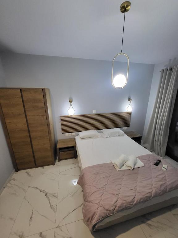 Postel nebo postele na pokoji v ubytování Diamond Piraeus Port