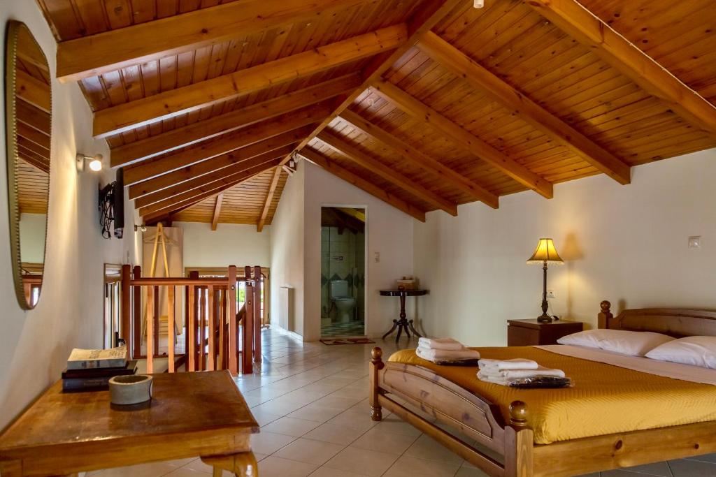 Postel nebo postele na pokoji v ubytování Eleni Suites Methoni