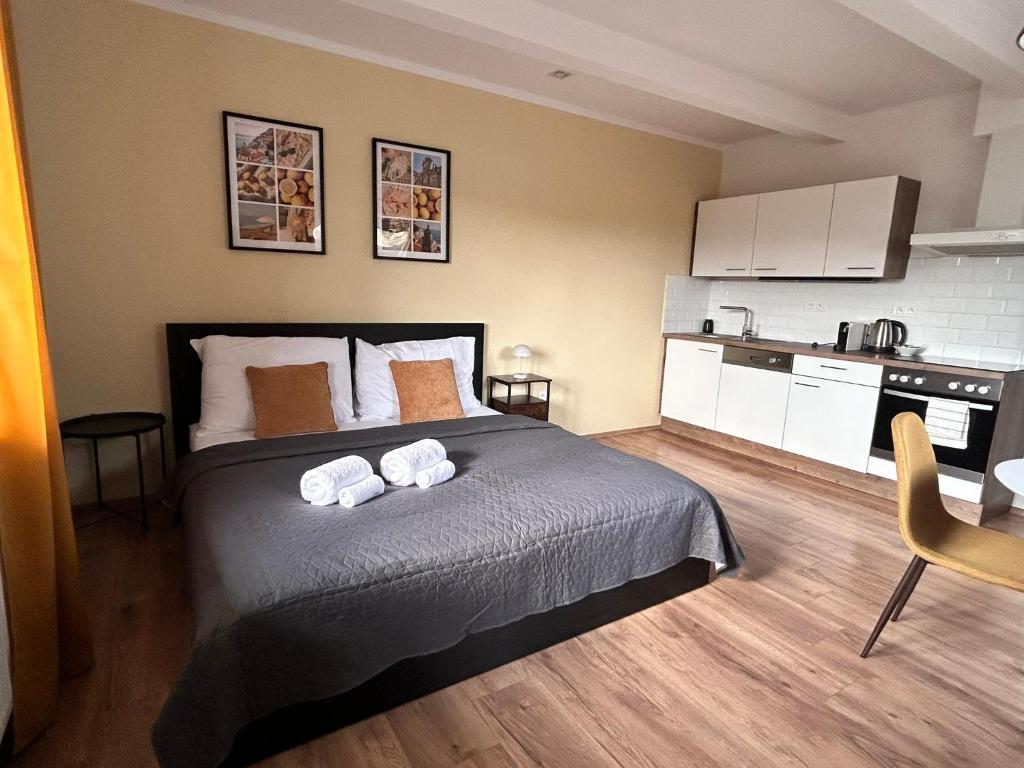 Postel nebo postele na pokoji v ubytování DORMIDARE Apartments Mladá Boleslav