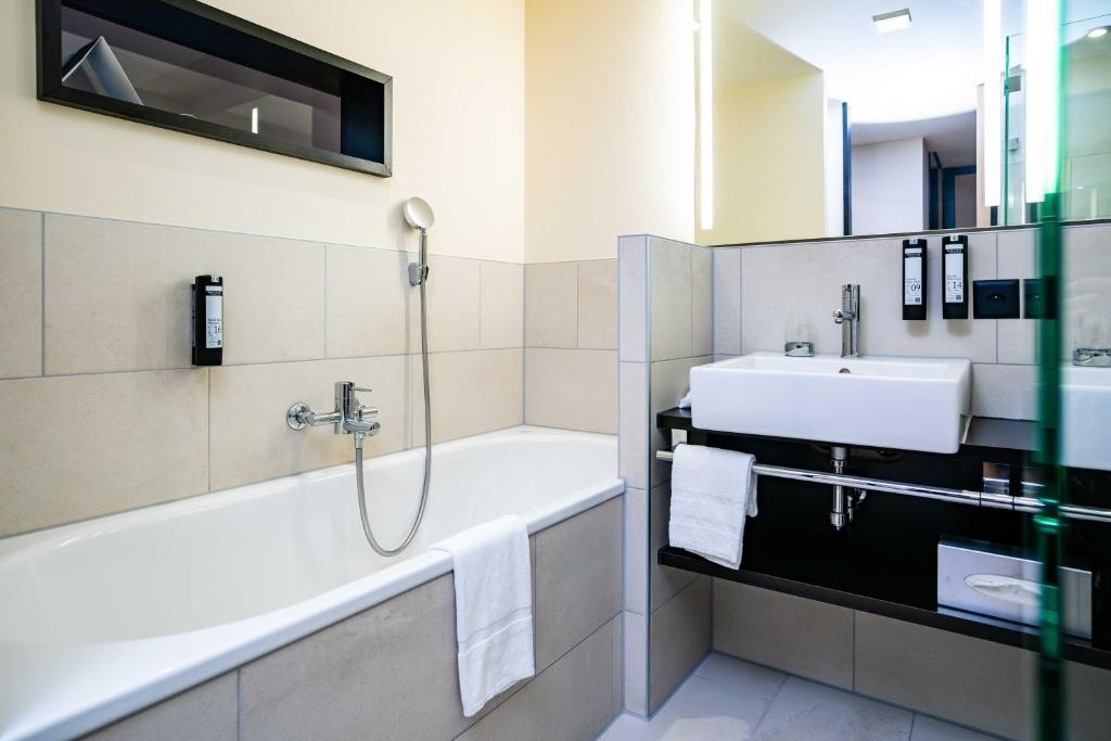 Vannituba majutusasutuses Hotel Seepark Thun