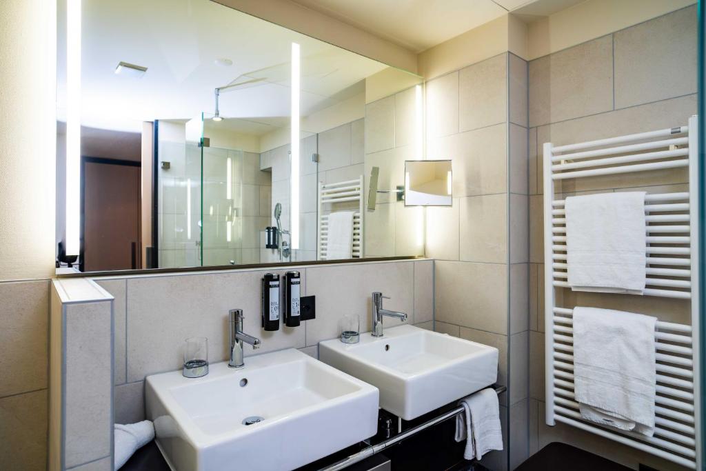 Vannituba majutusasutuses Hotel Seepark Thun