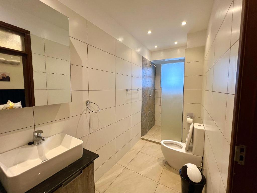 Koupelna v ubytování Coastal Serenity Suite Beach Front Apt