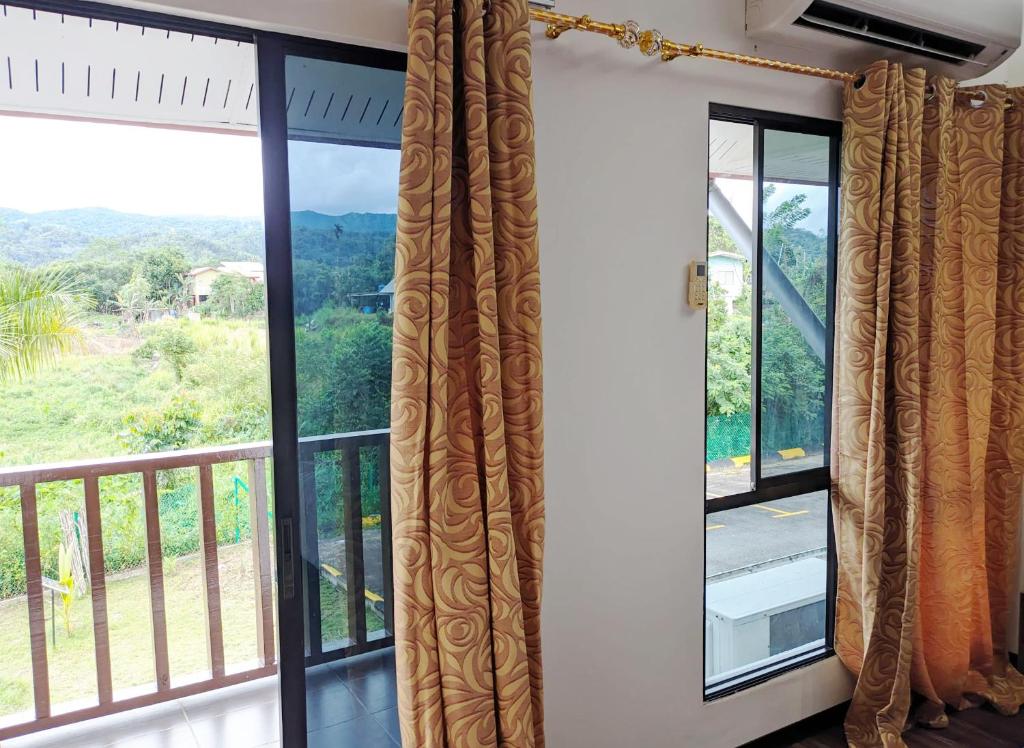 Balkón nebo terasa v ubytování Nucifera Hotel Tambunan