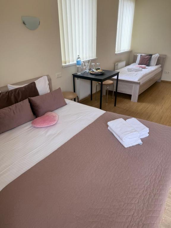 Un ou plusieurs lits dans un hébergement de l'établissement Palanga City center