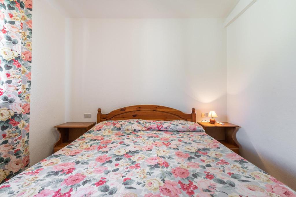 Łóżko lub łóżka w pokoju w obiekcie Casa Nicoletta
