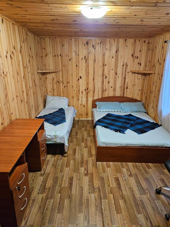 Postel nebo postele na pokoji v ubytování База відпочинку Енергія